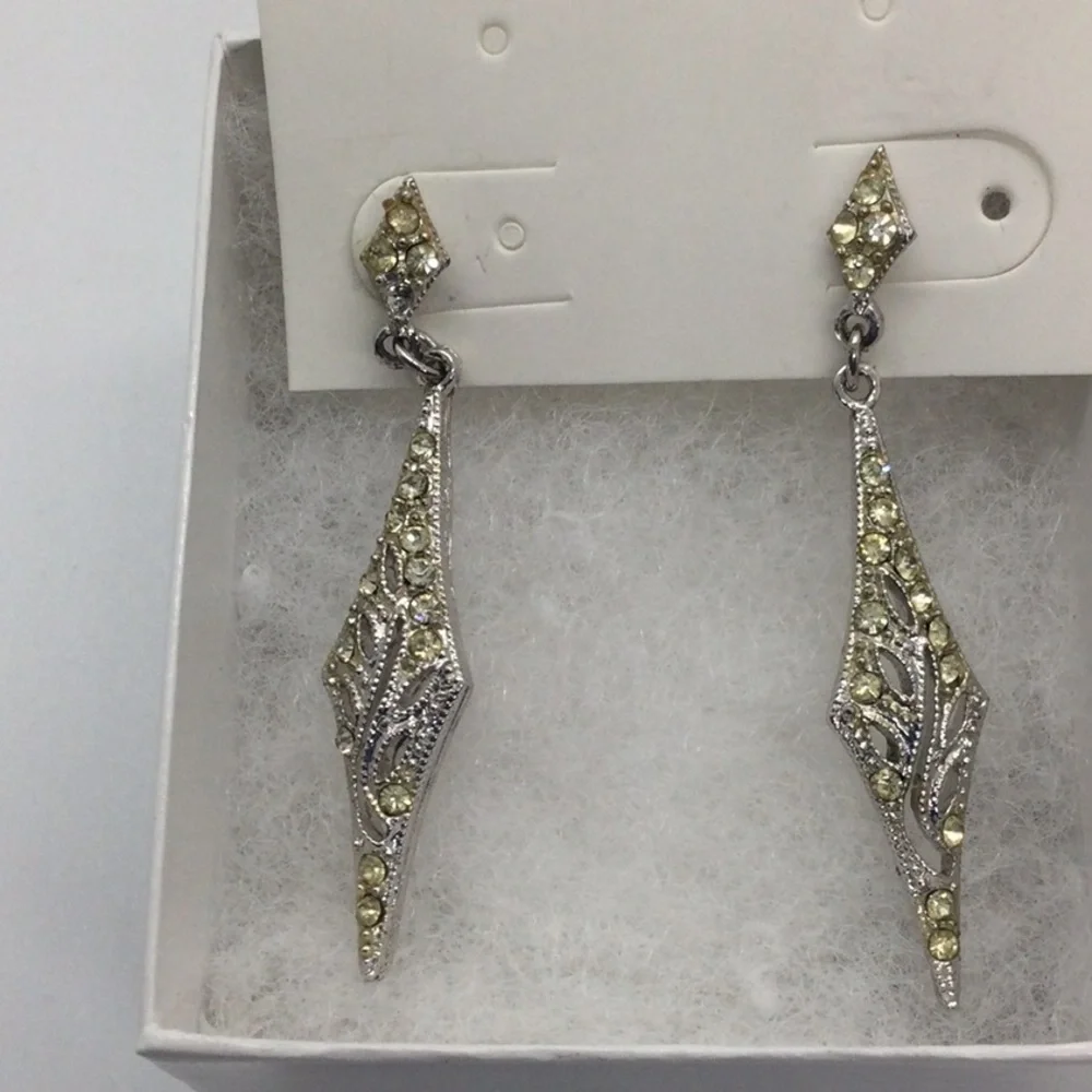 Woman’s Pierce Earrings marked Hedy. Very elegant.